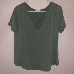 Shirt crosses in front